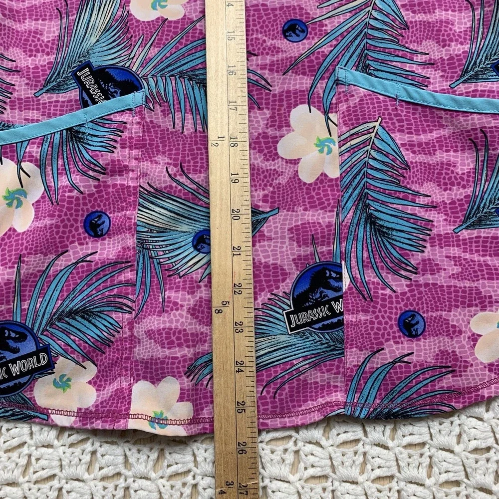 Jurassic Scrub Top Sz S Park Dominion Universe Studio Dino Skin Floral Pink Blue